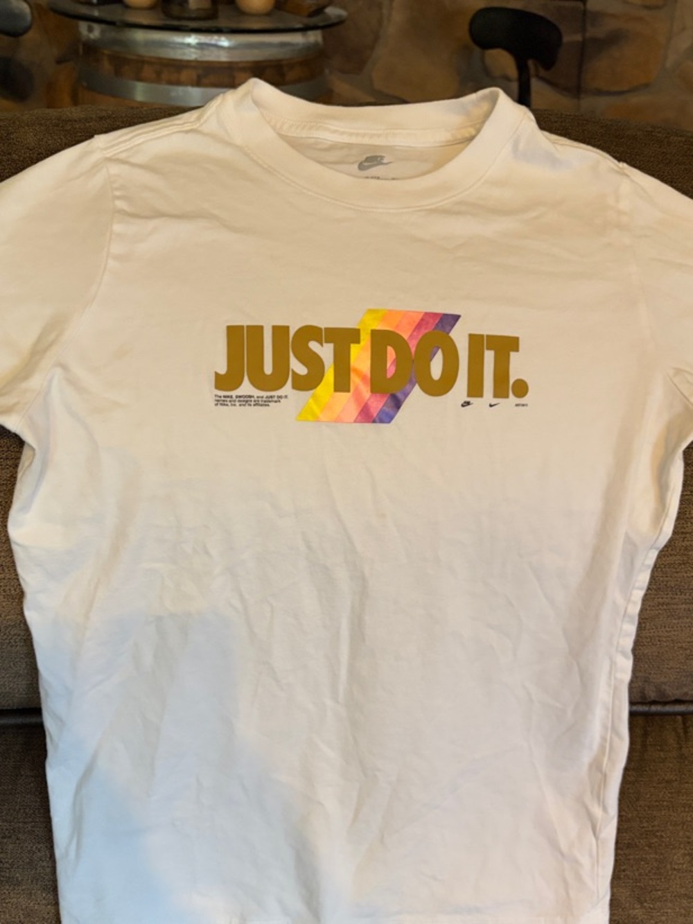 Boys Nike White Tee with Gold "JUST DO IT." and Rainbow Accent